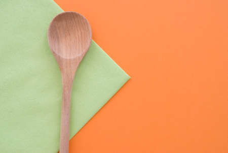 wooden spoon on colored backgroundの写真素材