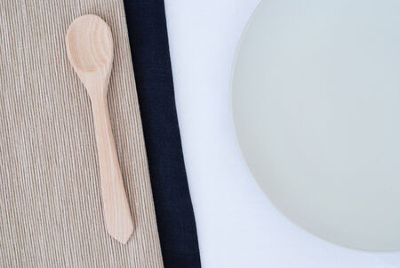wooden spoon and tableclothの写真素材
