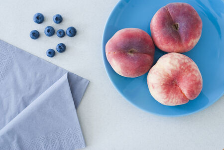asian peaches and blueberryの写真素材