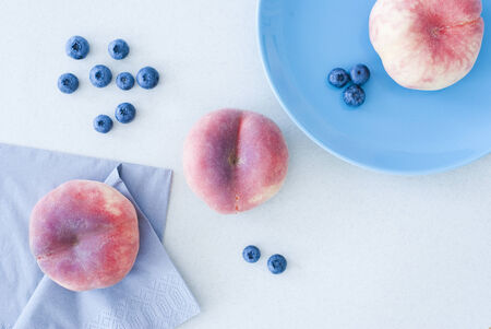 asian peaches and blueberryの写真素材