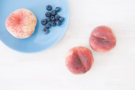 asian peaches and blueberryの写真素材