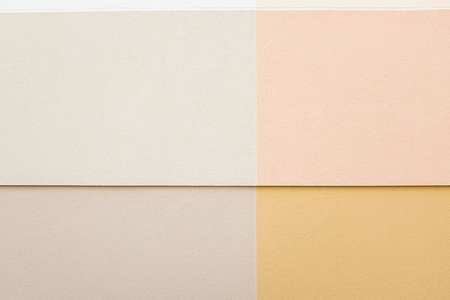 geometric shapes painted on textured cement wallの写真素材