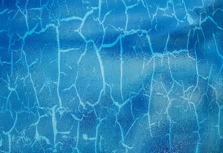 graphic lines on dry textured ceramic backgroundの写真素材