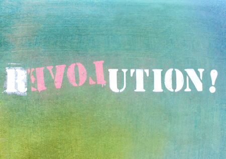revolution - love graffiti on textured wallの写真素材