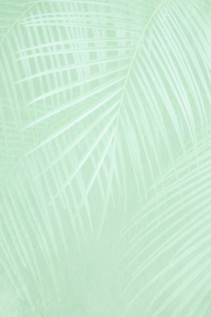 colored exotic jungle print on silk textureの写真素材