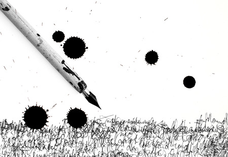 ancient pen and inkblot on calligraphy paperの写真素材