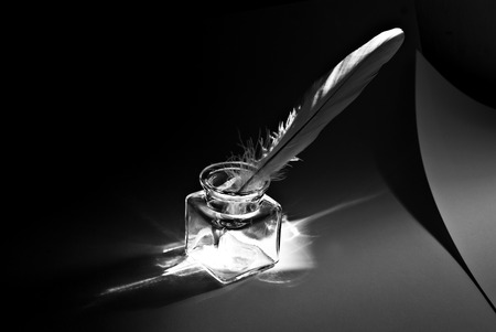 feather and ink pot black and whiteの写真素材