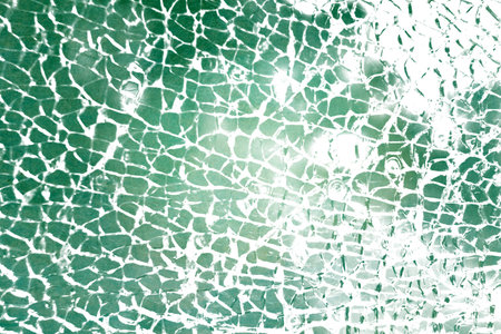 close up of colored broken glass - abstract textured backgroundの写真素材