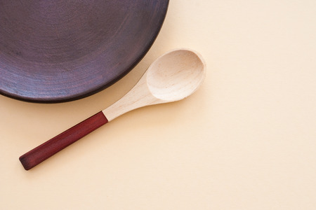 wooden spoons on bright background - copyspace for textの写真素材