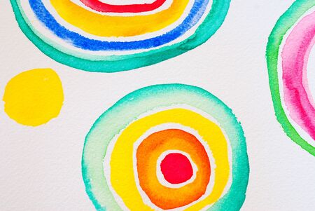 watercolours - circles on textured paper - abstract background designの写真素材