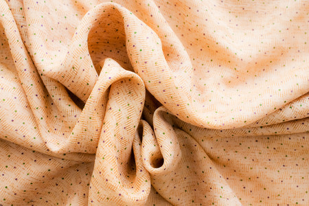 close up of yellow wrinkled cotton textileの写真素材