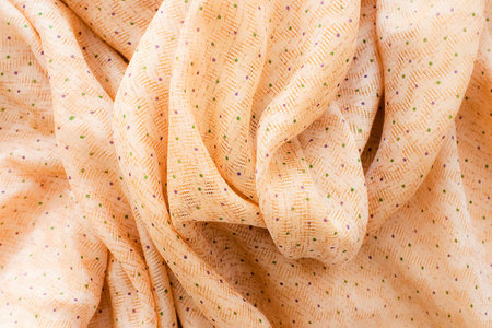 close up of yellow wrinkled cotton textileの写真素材