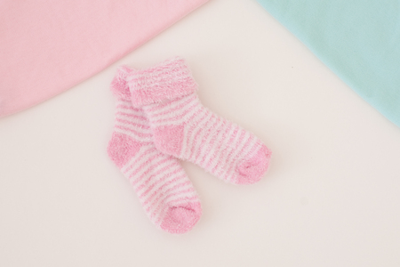 little baby socks on white background - studio shotの写真素材