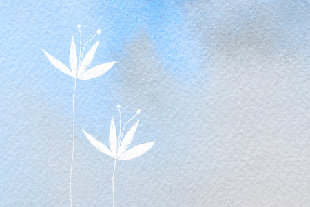 white flower painted on blurred colorful backgroundの写真素材