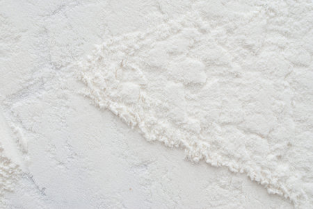 close up of white flour on wooden backgroundの写真素材