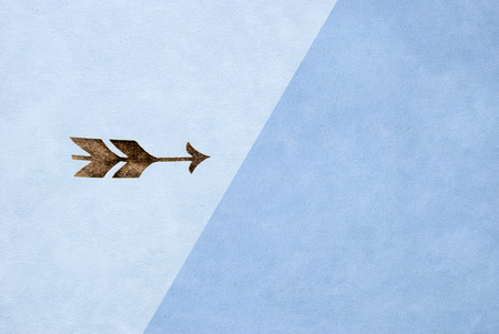 vintage arrow printed on antique  paper textureの写真素材