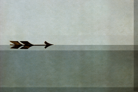 vintage arrow printed on antique  paper textureの写真素材