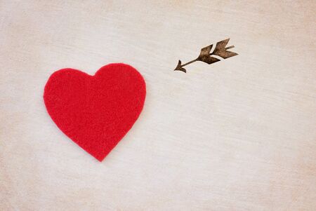 red heart and arrow - love symbol on white backgroundの写真素材