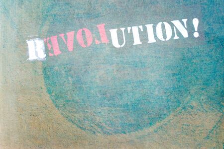 revolution on textured wallの写真素材