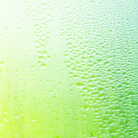 Water drops on the window - abstract backgroundの写真素材
