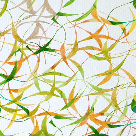 green Tropical leaves on textured paper textureの写真素材