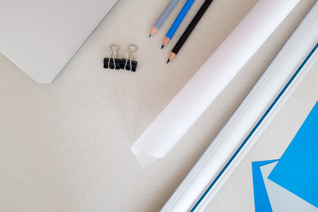 office tools on paper background - design desktopの写真素材
