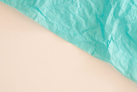 blue paper on white surface - design background
