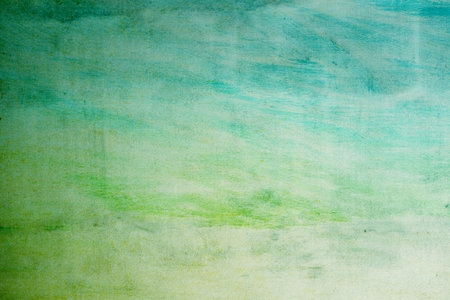 green watercolors on paper surface
