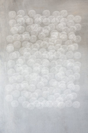 hand painted spiral design on grey textured background 