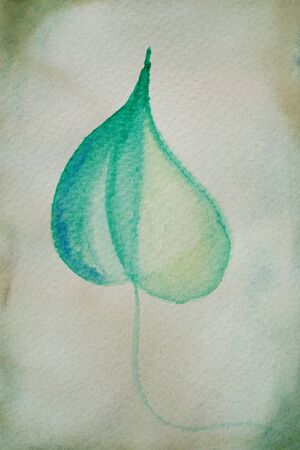 green hand painted leaf - watercolor on textured paperの写真素材