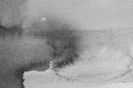 black watercolor - ink on paper backgroundの写真素材