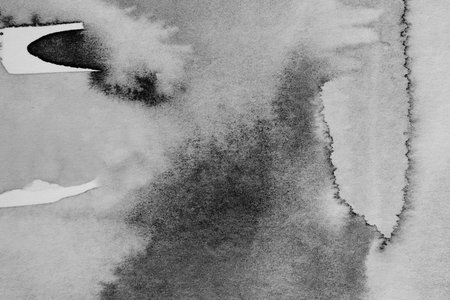 black watercolor - ink on paper backgroundの写真素材