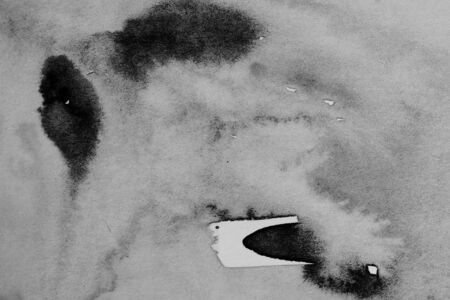 black watercolor - ink on paper backgroundの写真素材