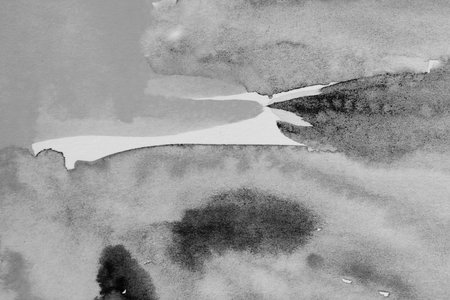 black watercolor - ink on paper backgroundの写真素材