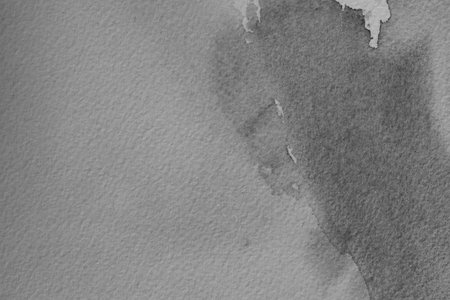 black watercolor - ink on paper backgroundの写真素材