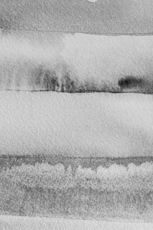 black watercolor - ink on paper backgroundの写真素材
