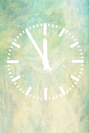 classic clock on green backgroundの写真素材