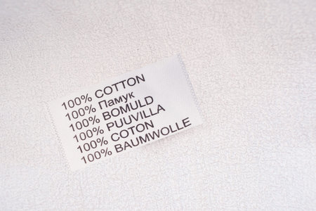 label 100% cotton on textile background
