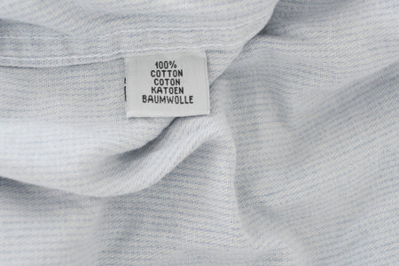 label 100% cotton on textile background