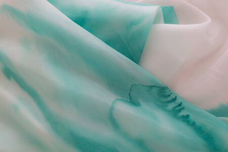 blue silk - close up of a silk scarf - pastel toneの写真素材