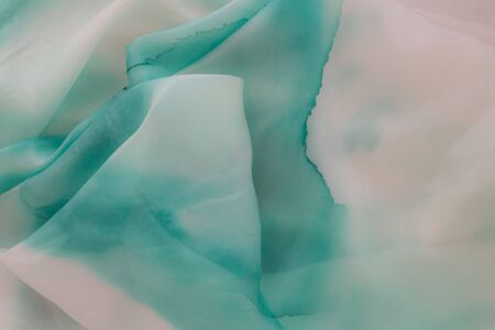 blue silk - close up of a silk scarf - pastel toneの写真素材