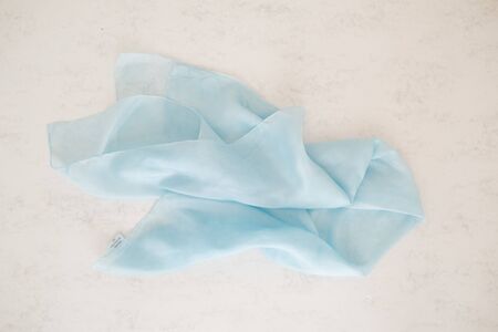 blue silk - close up of a silk scarf - pastel toneの写真素材