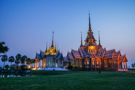 Beautiful Buddhist church during sunsetの写真素材