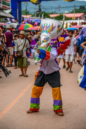 LOEI, THAILAND - JUNE 27, 2015 : Thai northeastern traditional Phi Ta Khon ghost festival parade on June 27, 2015 in Dansai of Loei, Thailandのeditorial素材