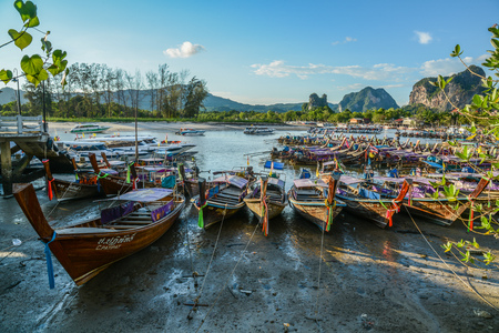 Krabi, Thailand - May 4, 2015: Tourist boats floating on sea of bay to provide transportation service to tourists to any other islands nearby Krabi, Thailand.のeditorial素材