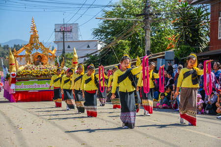 CHIANGMAI, THAILAND - JANUARY 25, 2015: Indigenous little girls with traditional costume dancing in traditional style in parade of 22nd Traditional Skirt Fabric and The Indigenous Product and Culture Festival in Mae Chaem, Chiangmai, Thailandのeditorial素材