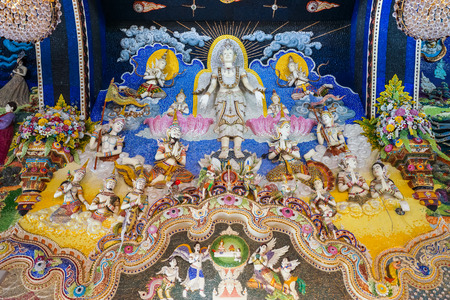 Bangkok, Thailand - July 15, 2015: Thai beautiful literature statues to be decorated on Buddhist church wall at Pariwas temple where is destination of tourists in Bangkok, Thailandのeditorial素材