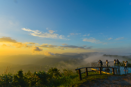 Loei, Thailand - June 28, 2015: Tourists and  photographers shooting photo of beautiful sunrise view in national park of Thailandのeditorial素材