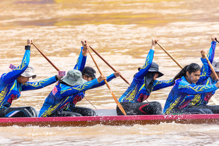 Pichit, Thailand - September 1, 2018: Annual long boat racing festival on Nan river in front of Tha...