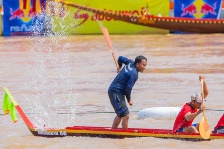 Pichit, Thailand - September 1, 2018: Annual long boat racing festival on Nan river in front of Tha Luang Buddhist temple in Pichit, Thailandのeditorial素材